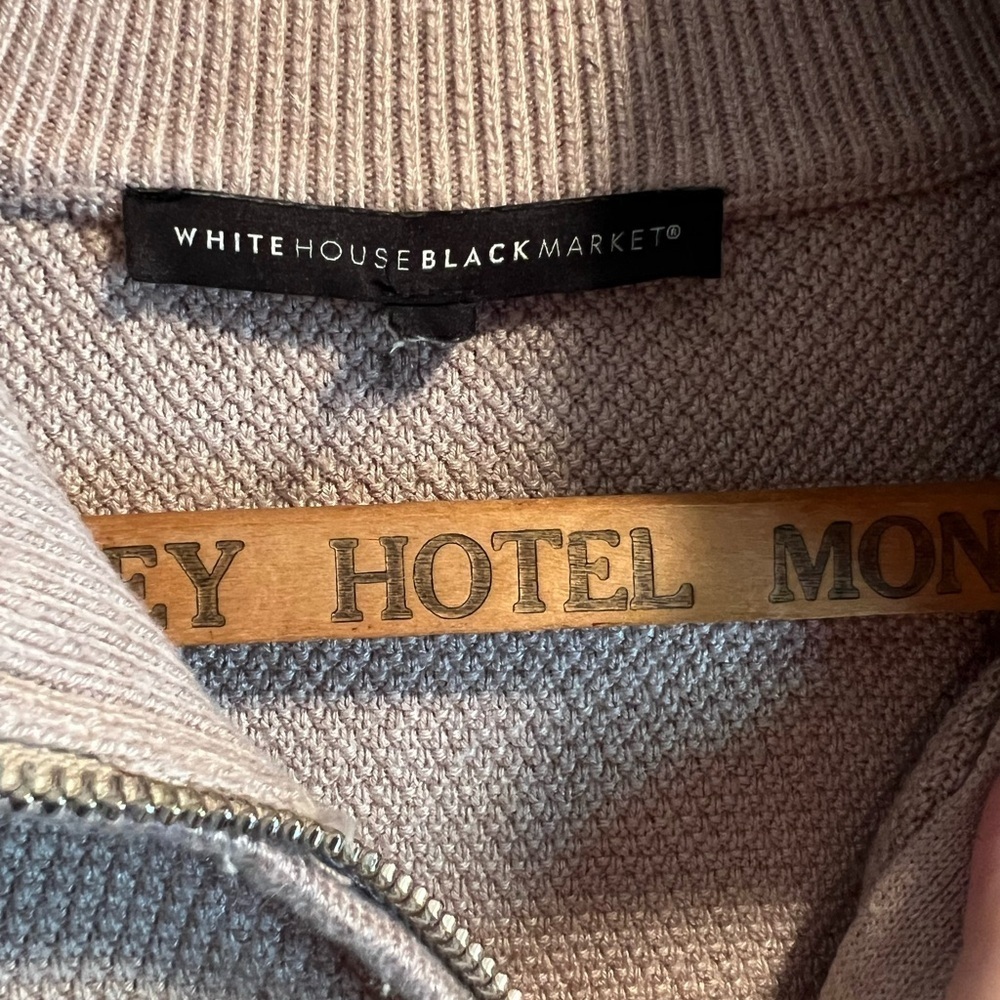 Whitehouse Black Market tan sweater. Zip up, half sleeves. Rounded bottom.